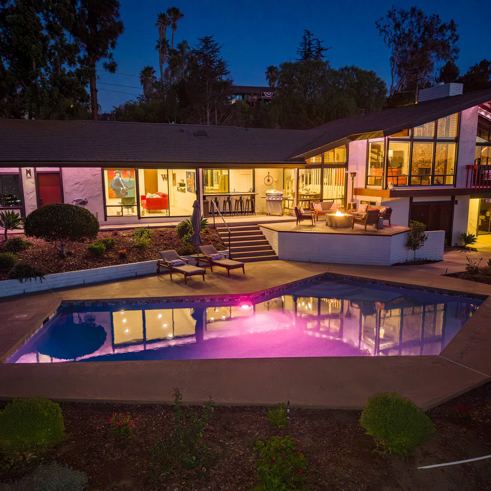 Aerial view of a swimming pool and patio at twilight at a La Mesa home near Mt. Helix.